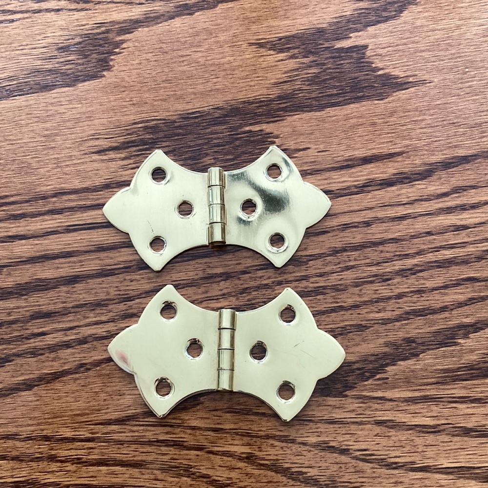 Brass tone hinges